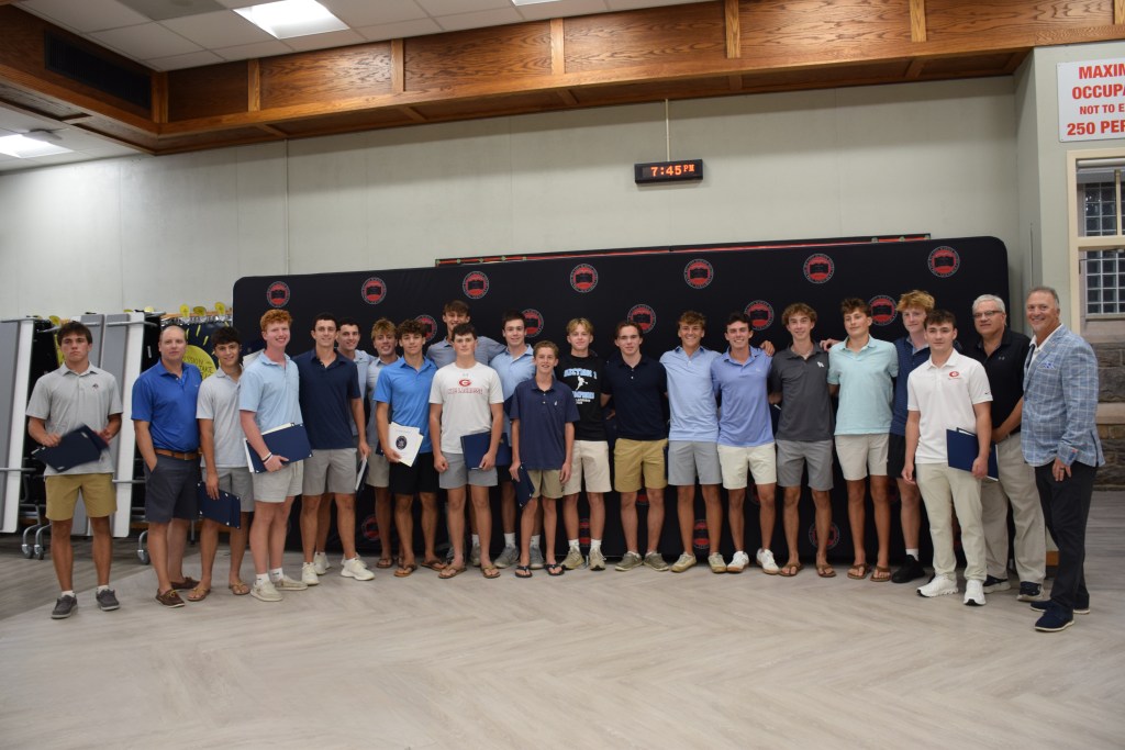 (PHOTO: Photo caption: Members of the 2026 New York State champion Rye High School varsity boys lacrosse team are recognized with the Rye Recognition of Excellence Award during the September 8 board of education meeting. Credit: Rye City School District.)