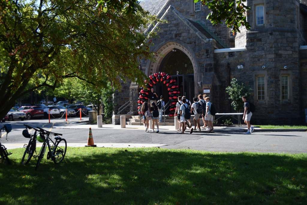 Students entering a school building