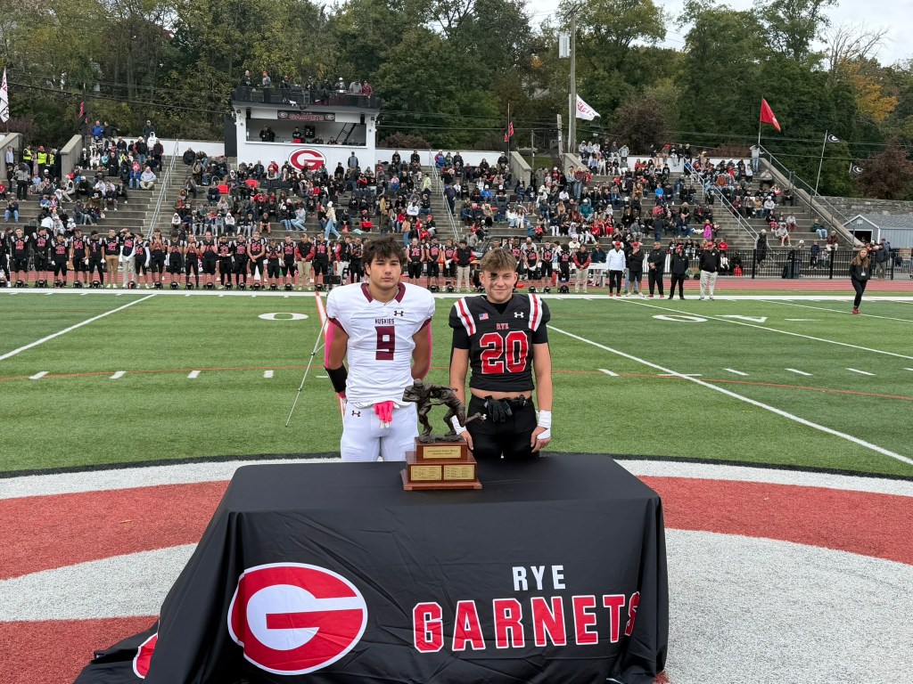(PHOTO: Harrison Varsity Football's Jason Crupi (left) and Rye Varsity Football's Jagger Fenton (right) winning the Christopher Mello Award on October 17, 2026.)