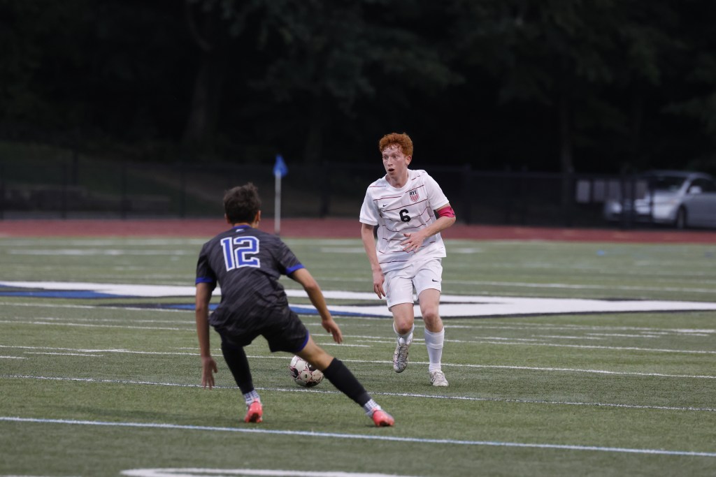 (PHOTO: Rye Boys Soccer's Peter Wilmot (#6 white) from September 2026. Credit: Alvar Lee.)