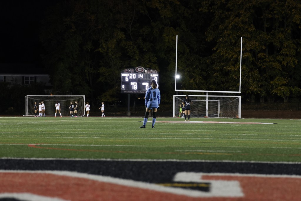 (PHOTO: Rye Girls Soccer goalkeeper Mae Haesslein (#1) watching the Garnets win vs Sleepy Hollow on October 27, 2026. Credit: Alvar Lee.)