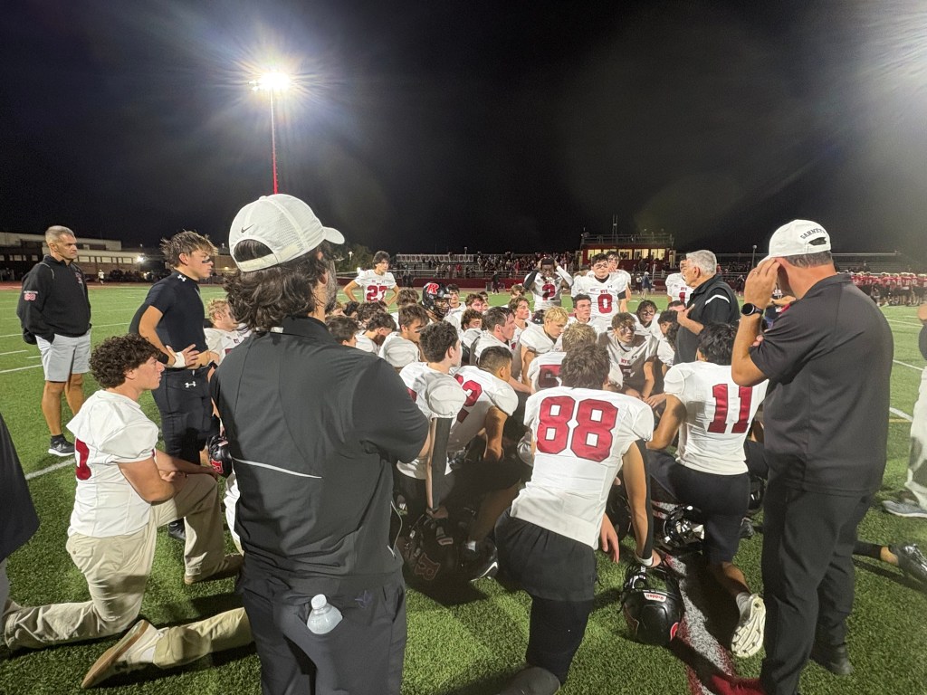 (PHOTO: The Rye Football team after a loss on October 2, 2026. Contributed.)
